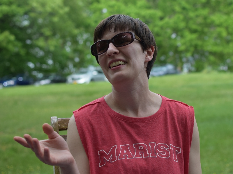 Amber in a Marist shirt talking