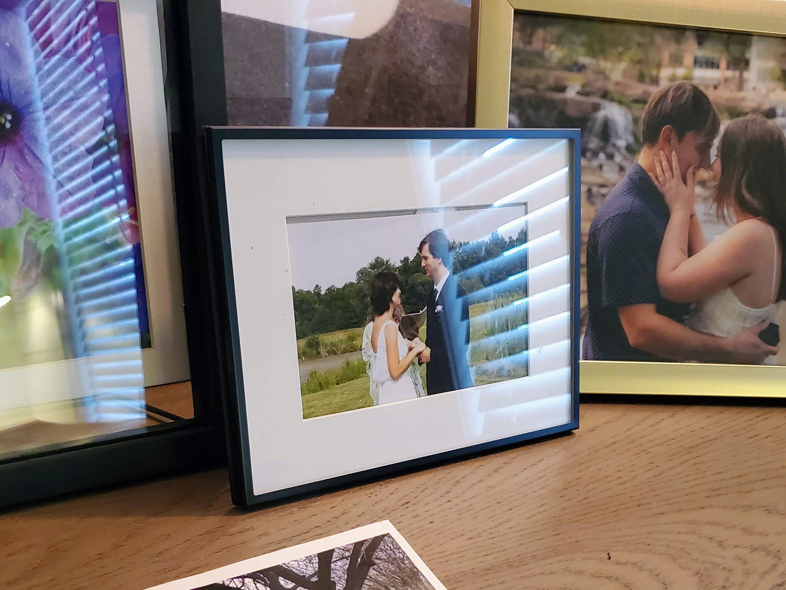 A framed picture of Amber and me getting married