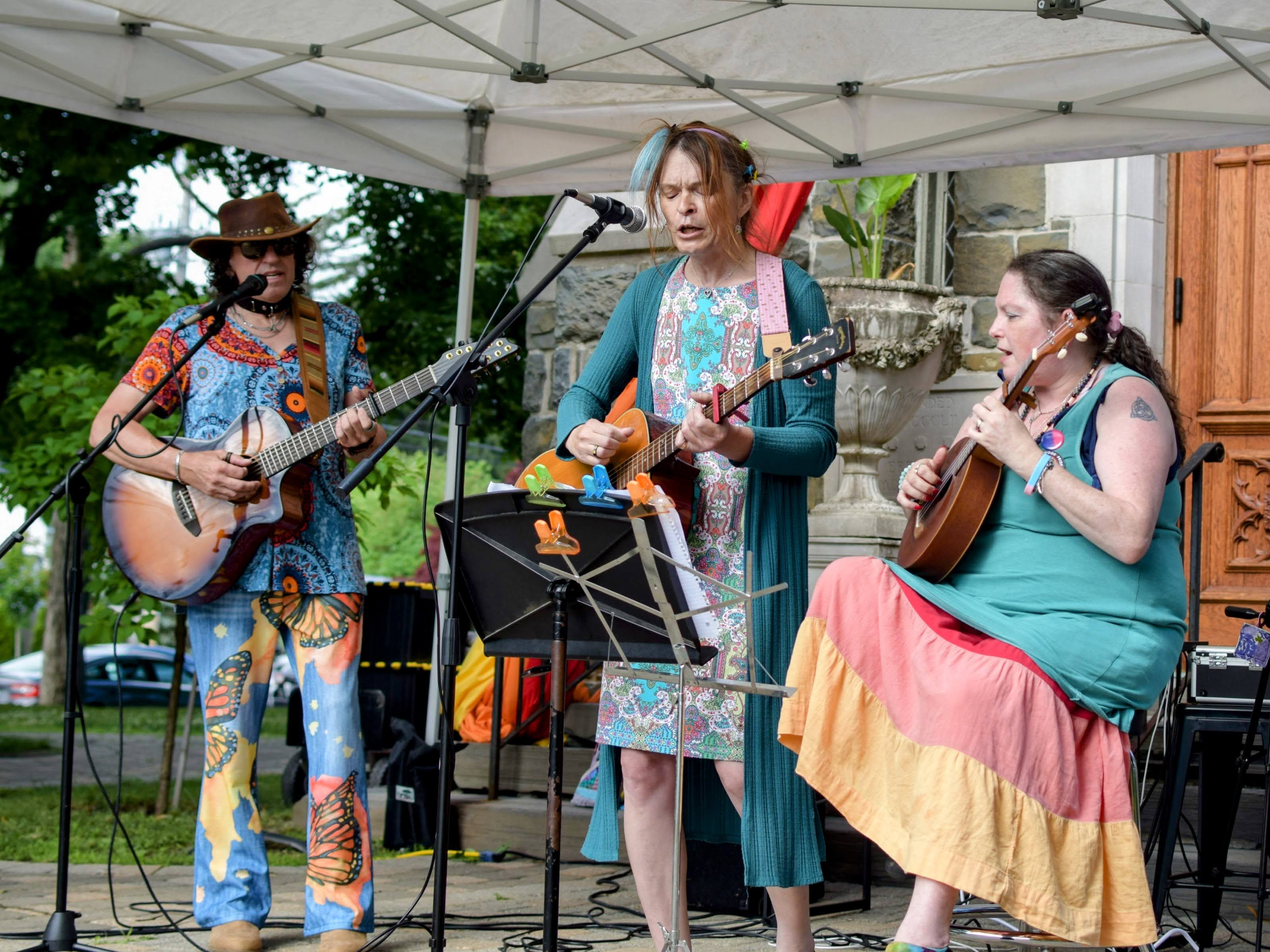 Three people playing music